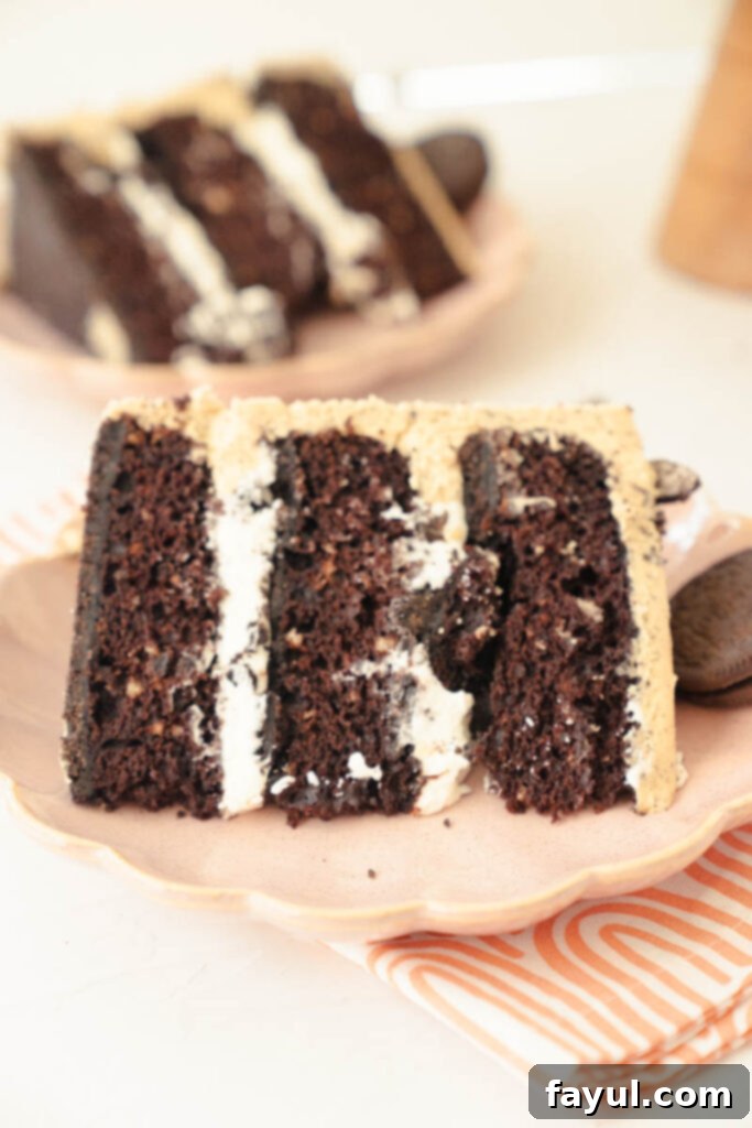 Assembled Oreo Peanut Butter Cake ready for final frosting