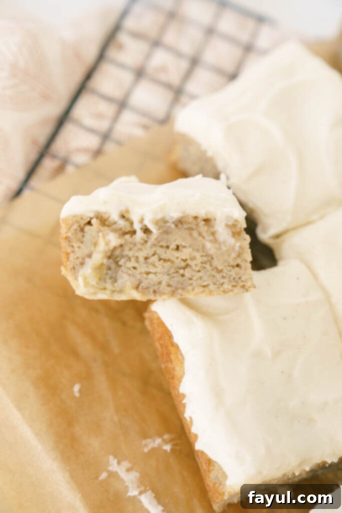 Close-up of the delicious vanilla bean cream cheese frosting on banana cake