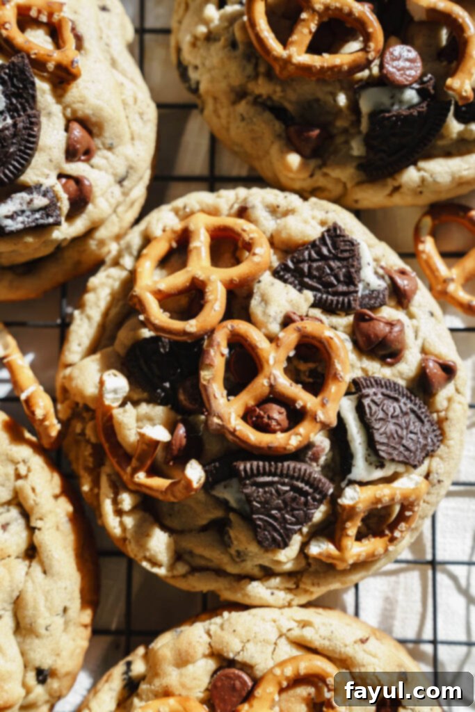 Freshly baked Peanut Butter Oreo Pretzel Cookies on a baking sheet