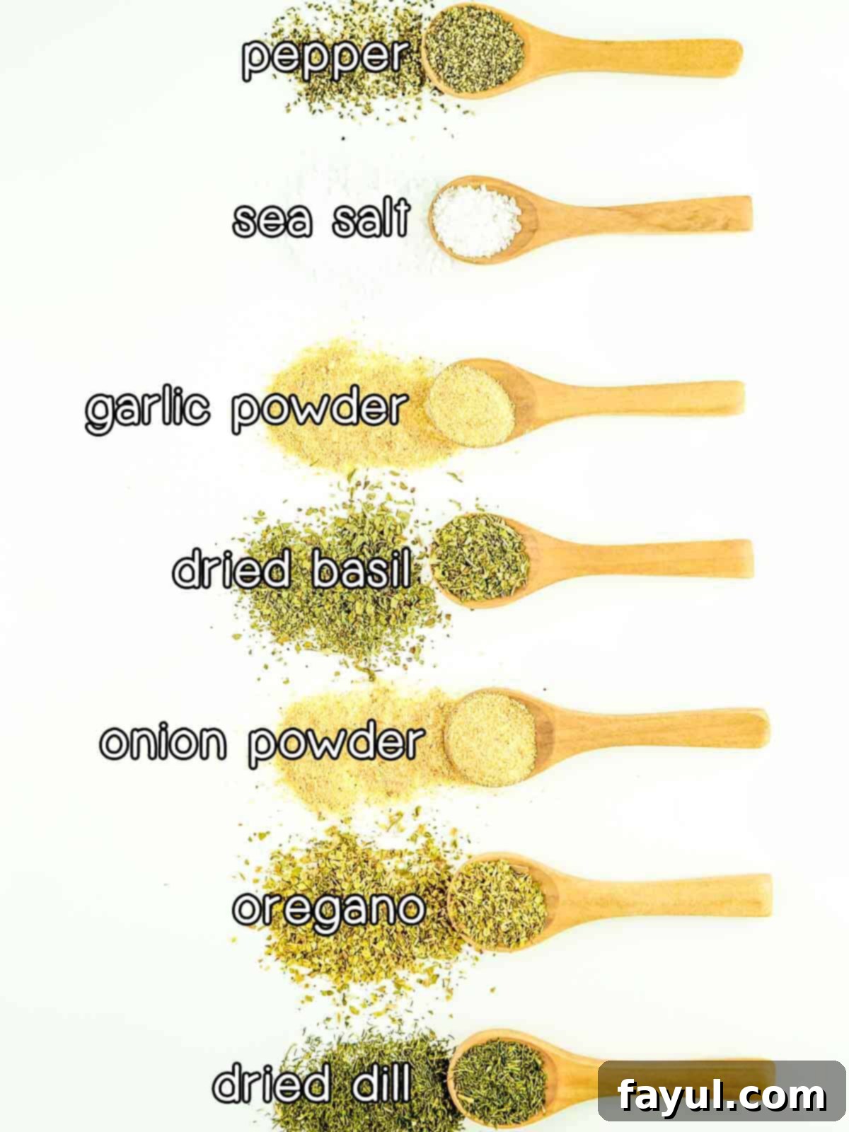 Overhead shot of ingredients - pepper, sea salt, garlic powder, dried basil, onion powder, oregano, and dried dill.