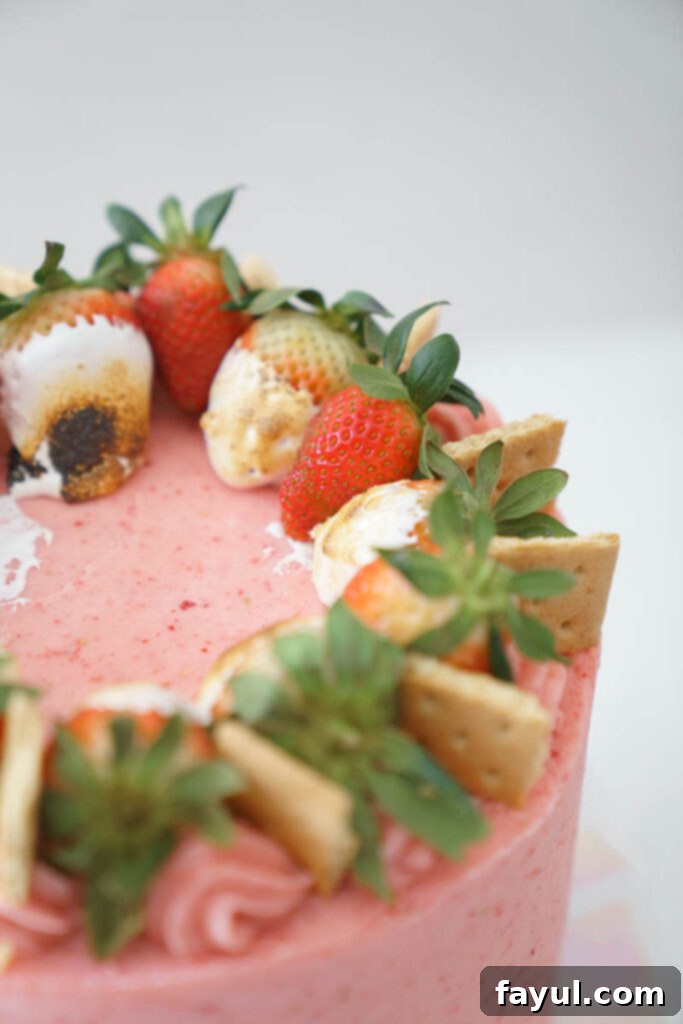 S'mores Strawberry Cake on a cake stand