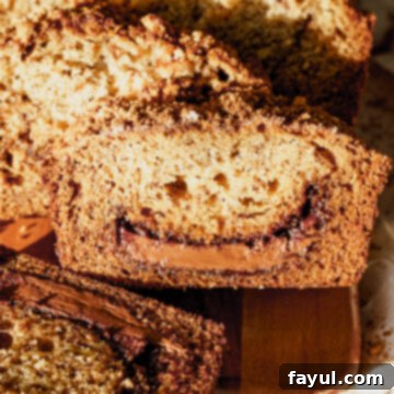 Nutella Banana Bread with a swirl and cinnamon crumb topping.