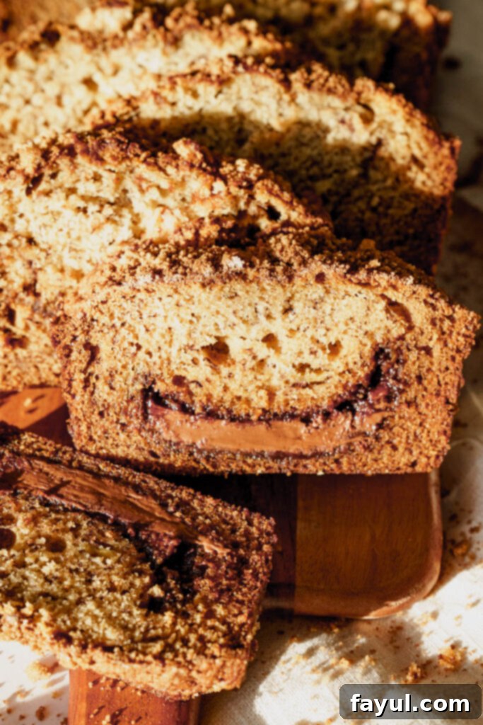 Another view of the baked Nutella banana bread, highlighting the texture and perfect golden-brown color.