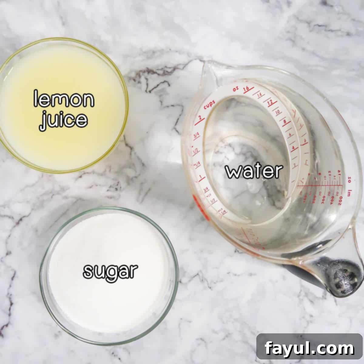Overhead shot of ingredients - lemon juice, water, and sugar.