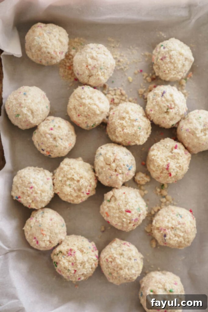 A bowl of perfectly melted white chocolate, smooth and ready for dipping, with a skewer resting on the rim.