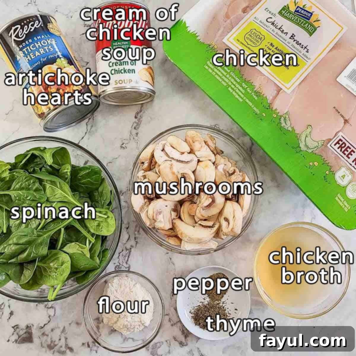 Overhead shot of ingredients - artichoke hearts, cream of chicken soup, chicken, spinach, mushrooms, chicken broth, flour, pepper, and thyme arranged neatly on a kitchen counter.