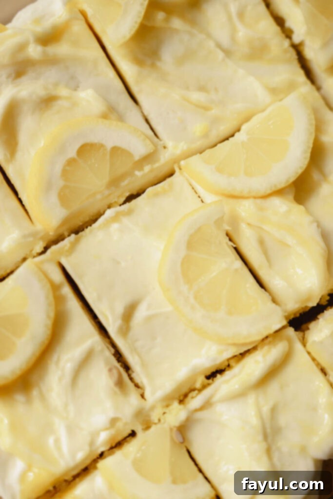 Lemon sheet cake slice on plate