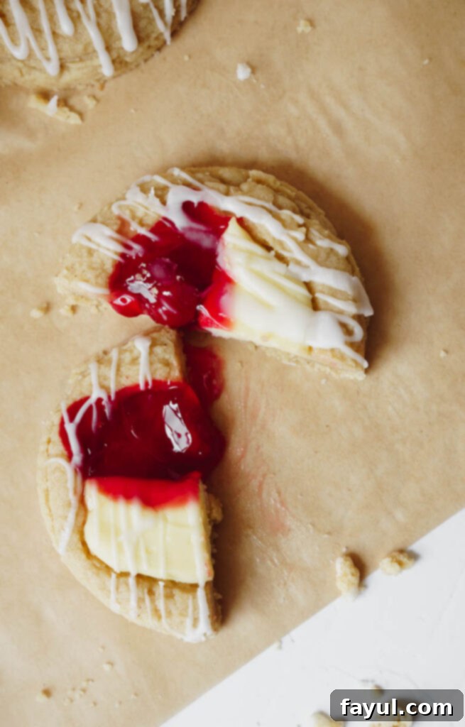 Cherry cheesecake cookie showing the filling close up