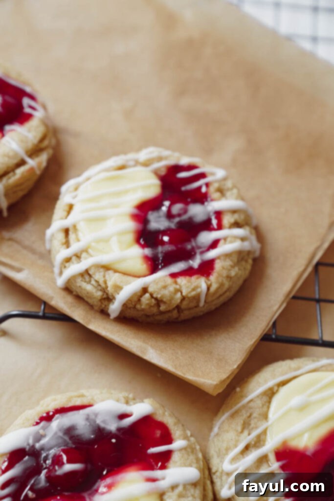 Cherry cheesecake cookie stack on a white plate