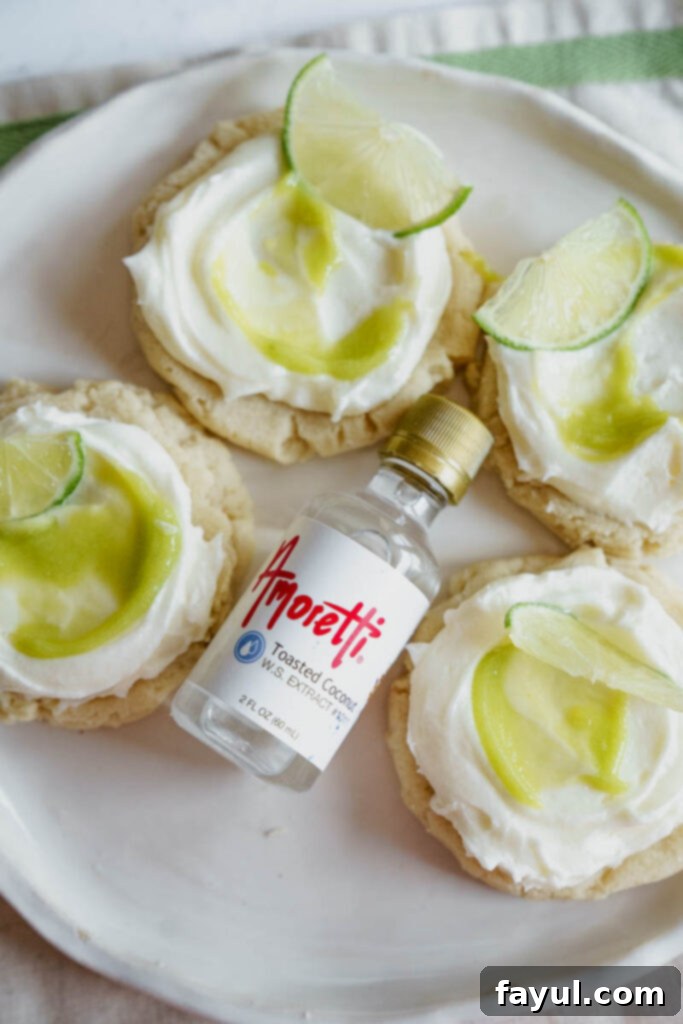 Close-up of a perfectly frosted coconut lime sugar cookie