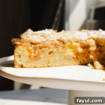 Peach Cobbler Cake, a dessert with moist cake and peach filling