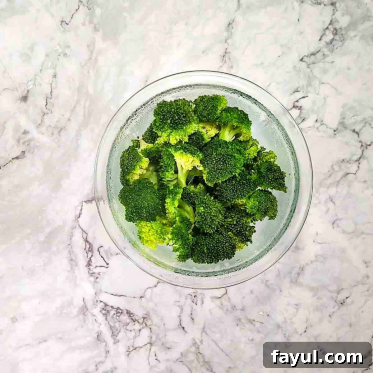 Overhead view of process shot 1 - steam broccoli in microwave.