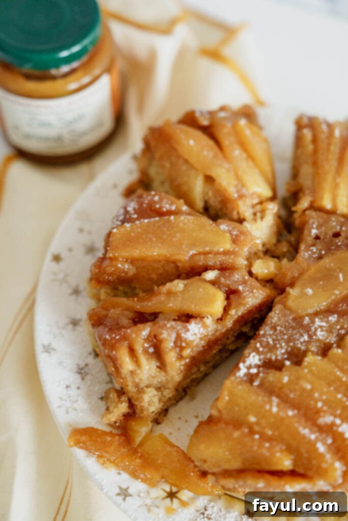 Caramel Apple Upside Down Cake with a spoonful of ice cream