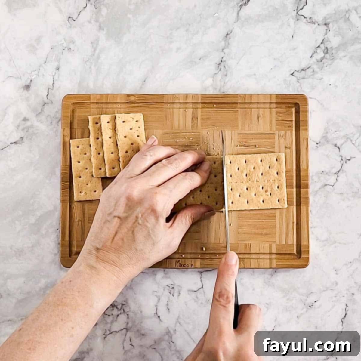 Overhead view of process shot 1 - cut or break the graham crackers to make 24 pieces.