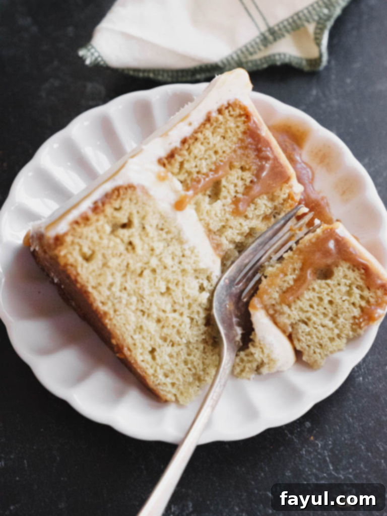 Chai Caramel Cake, a moist spice cake with cream cheese frosting and almond caramel drizzle