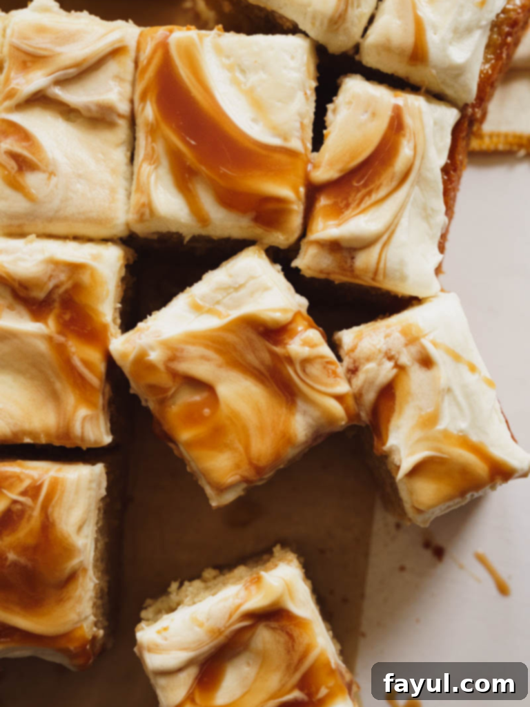 Delicious Caramel Apple Cake with Cream Cheese Frosting and Salted Caramel Swirls