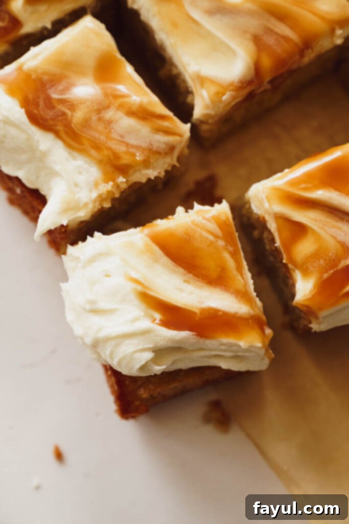 Close-up of the smooth and creamy texture of cream cheese frosting on a cake