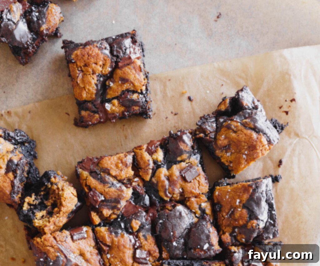 Close-up of a freshly baked Pumpkin Brookie bar, showcasing its moist texture