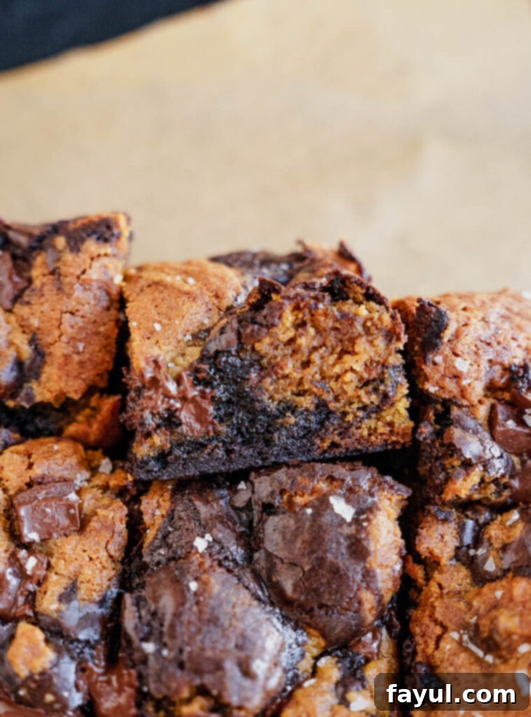 Close-up of a Pumpkin Brookie stack, highlighting the contrast between the brownie and cookie layers