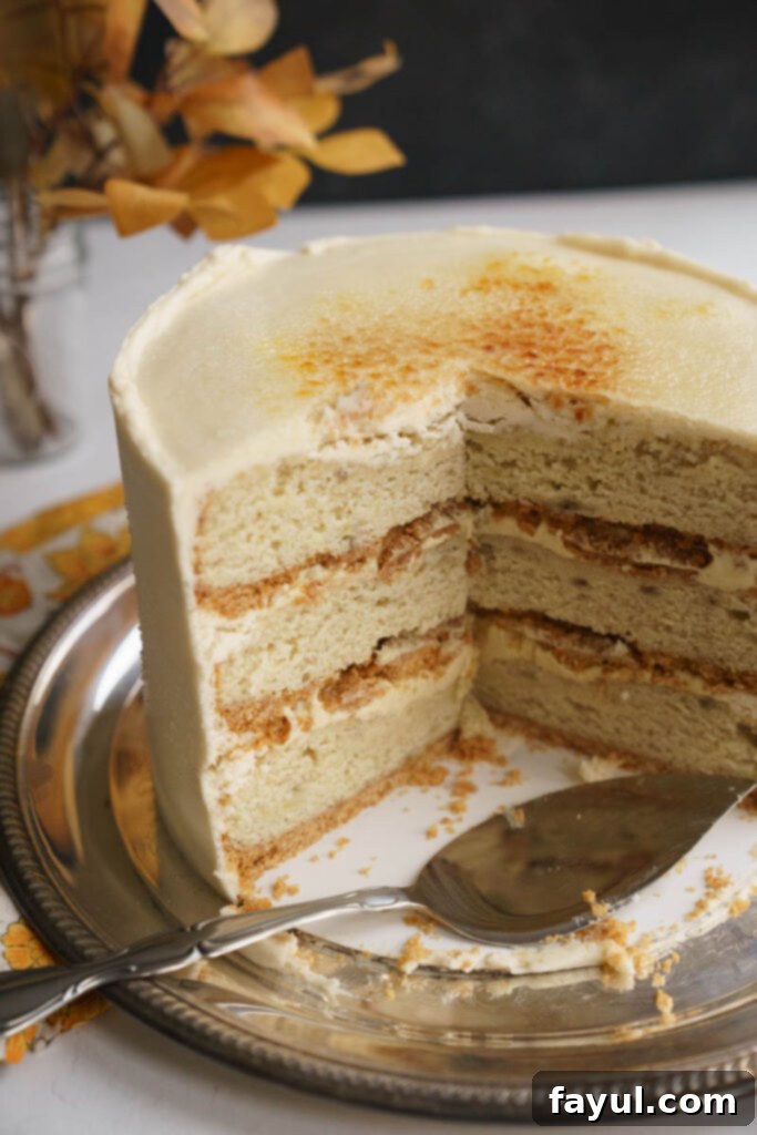 Banana Creme Brulee Cake slice on a white plate