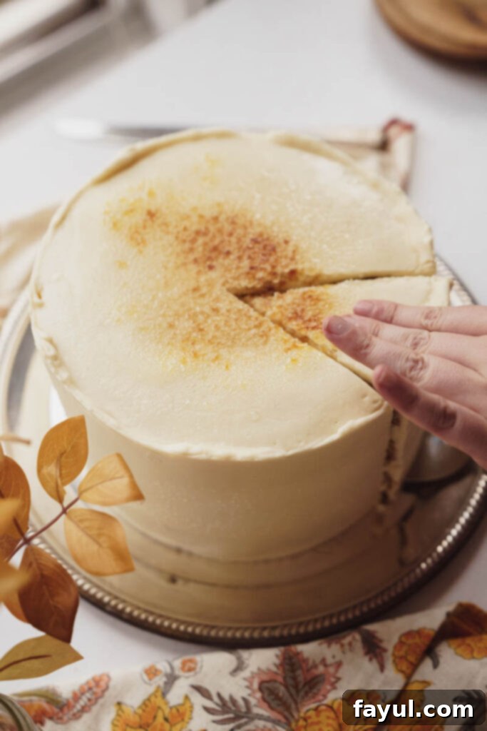 Caramelizing sugar on the Banana Creme Brulee Cake with a kitchen torch
