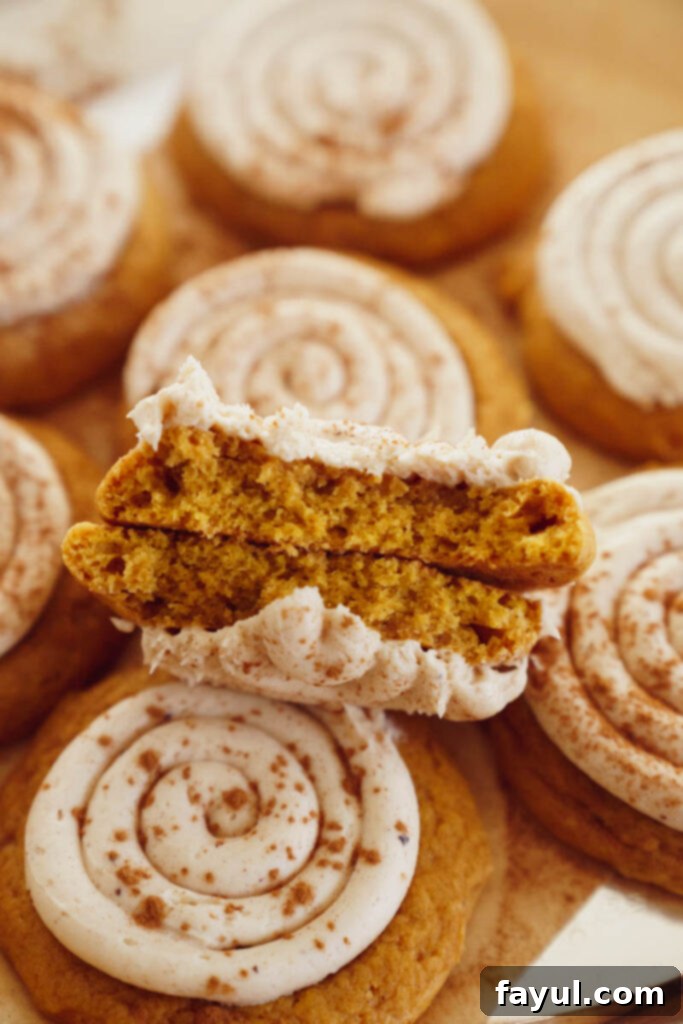 Creamy Pumpkin Spice Sugar Cookie 5 Frosted Pumpkin Sugar Cookie with a swirl of frosting and cinnamon dust