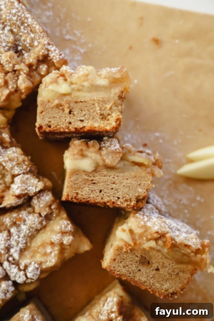 Apple Crisp Blondies in a baking pan, ready to be cut