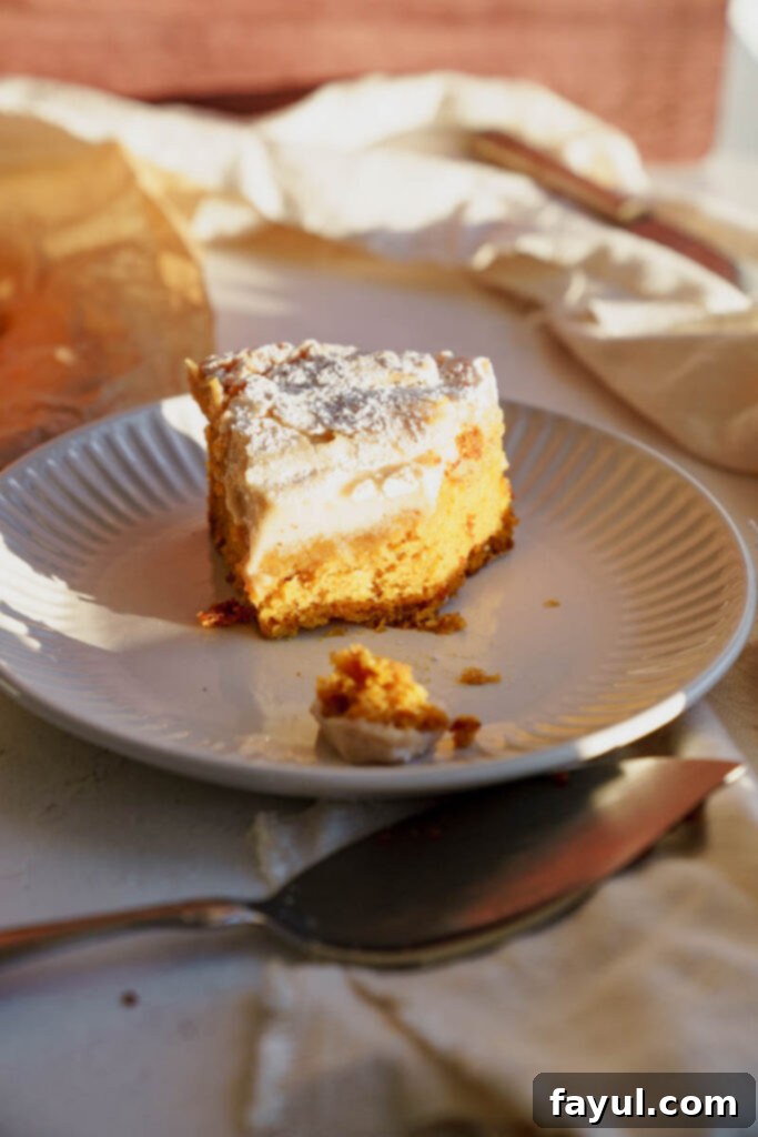 The finished Gooey Butter Pumpkin Cake, dusted with powdered sugar and ready to serve.