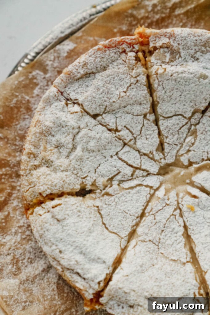 Close-up of the delicious Gooey Butter Pumpkin Cake with a fork, ready to be enjoyed.
