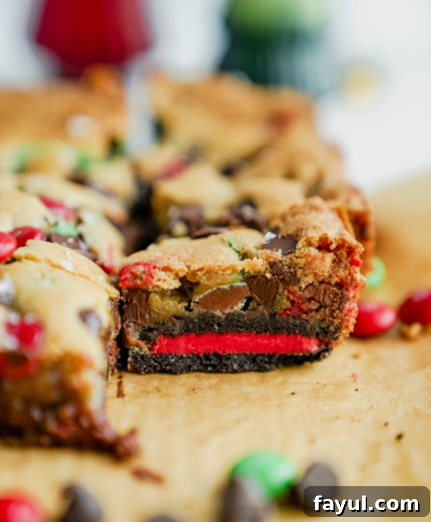 Close-up of baked Oreo M&M Blondies, showing a golden top and visible candies