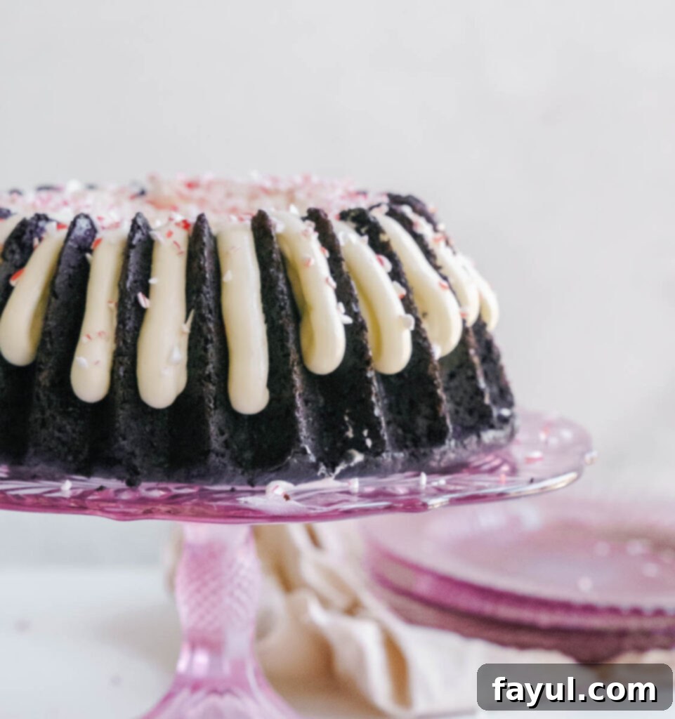 slice of chocolate peppermint bundt cake on a white plate