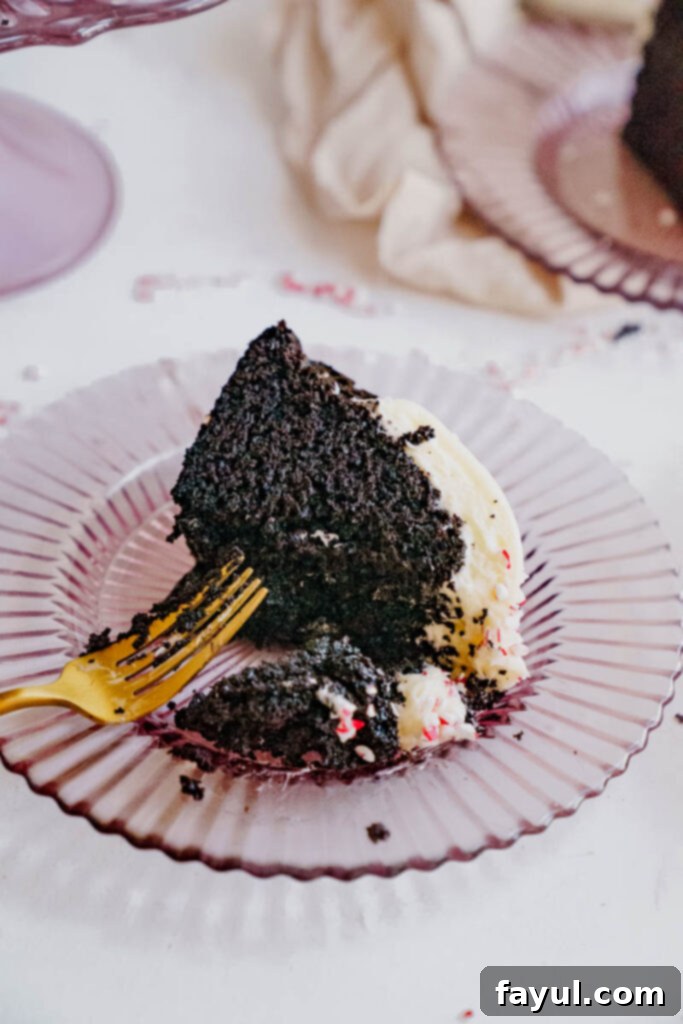 close up of chocolate peppermint bundt cake with frosting