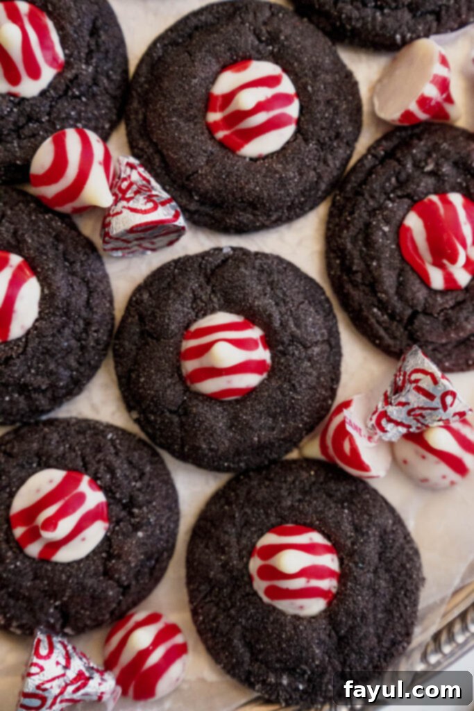 Side view of a batch of freshly baked Peppermint Kiss Chocolate Cookies
