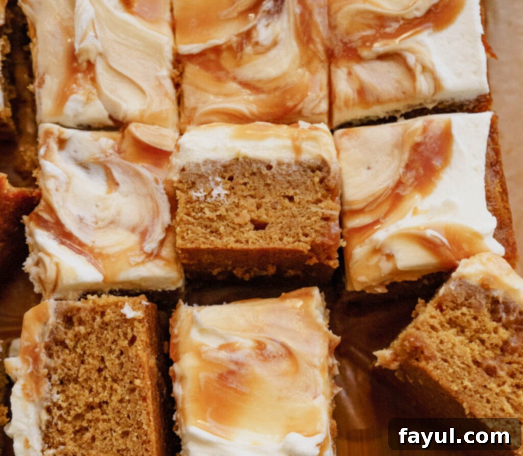 Warm, spiced gingerbread cake batter being poured into a baking pan.