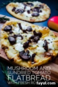 Simple and easy recipe for Vegetarian Flatbread Pizza with Mushrooms and Rosemary. Ready in about 30 minutes this pizza is perfect as an appetizer or as a fast weeknight dinner!