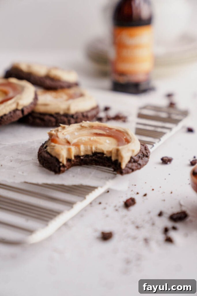 Another view of a stack of chocolate salted caramel cookies