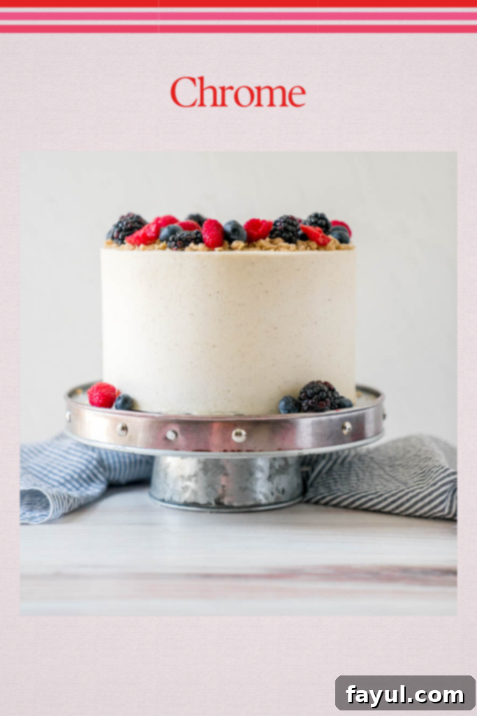 Sleek chrome cake stand with a modern cake design
