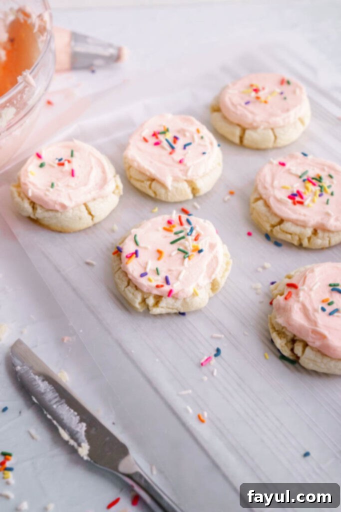Freshly baked Lofthouse style sugar cookies cooling on a wire rack