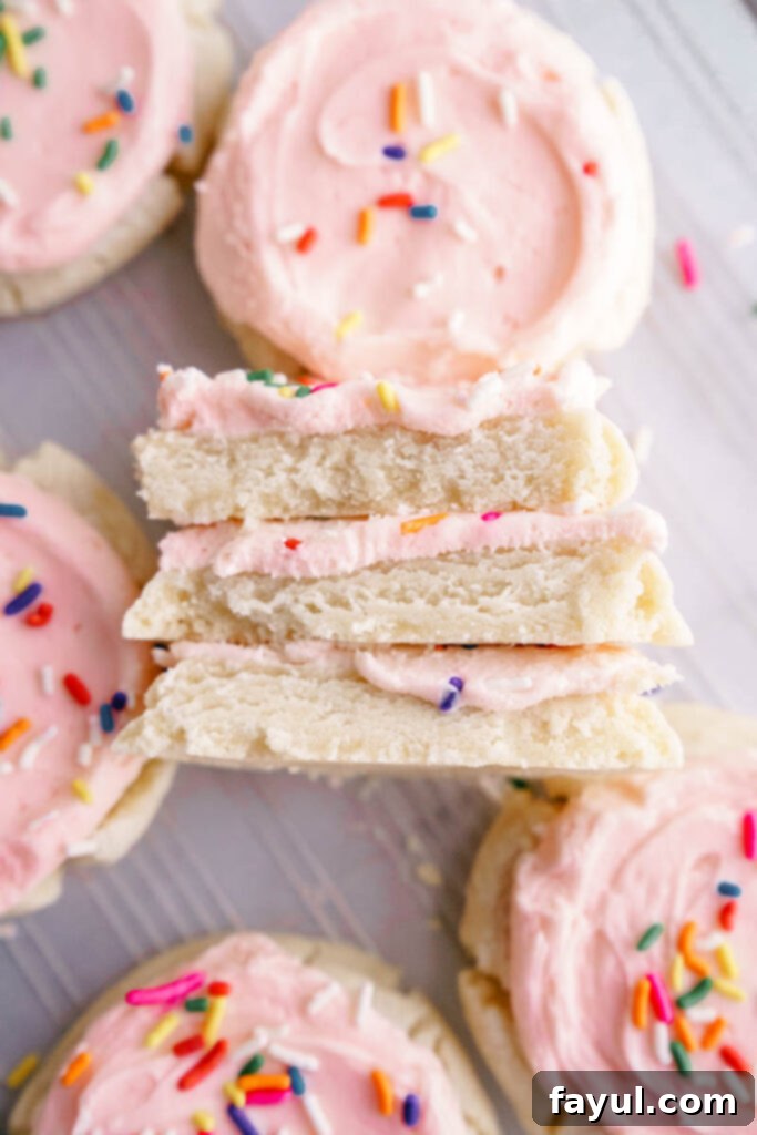 Pillowy soft unfrosted Lofthouse style sugar cookies on a white plate