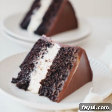 Homemade Ding Dong Cake with chocolate ganache and creamy filling.