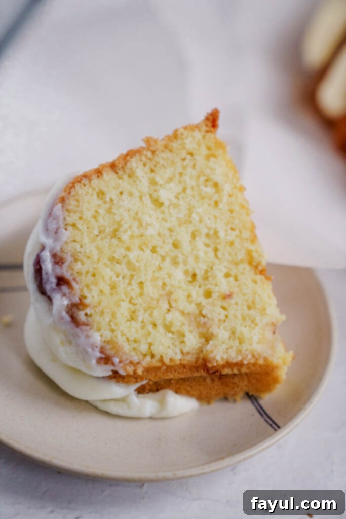 Close-up of Bundt cake with delicate cream cheese frosting