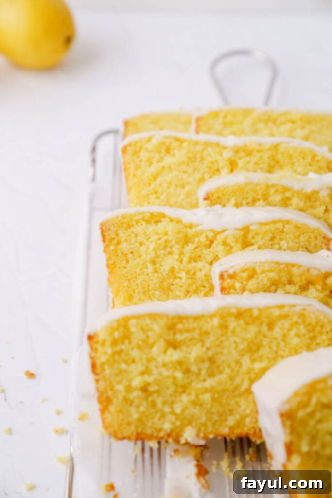Fresh lemons and a microplane zester, highlighting key ingredients for lemon loaf