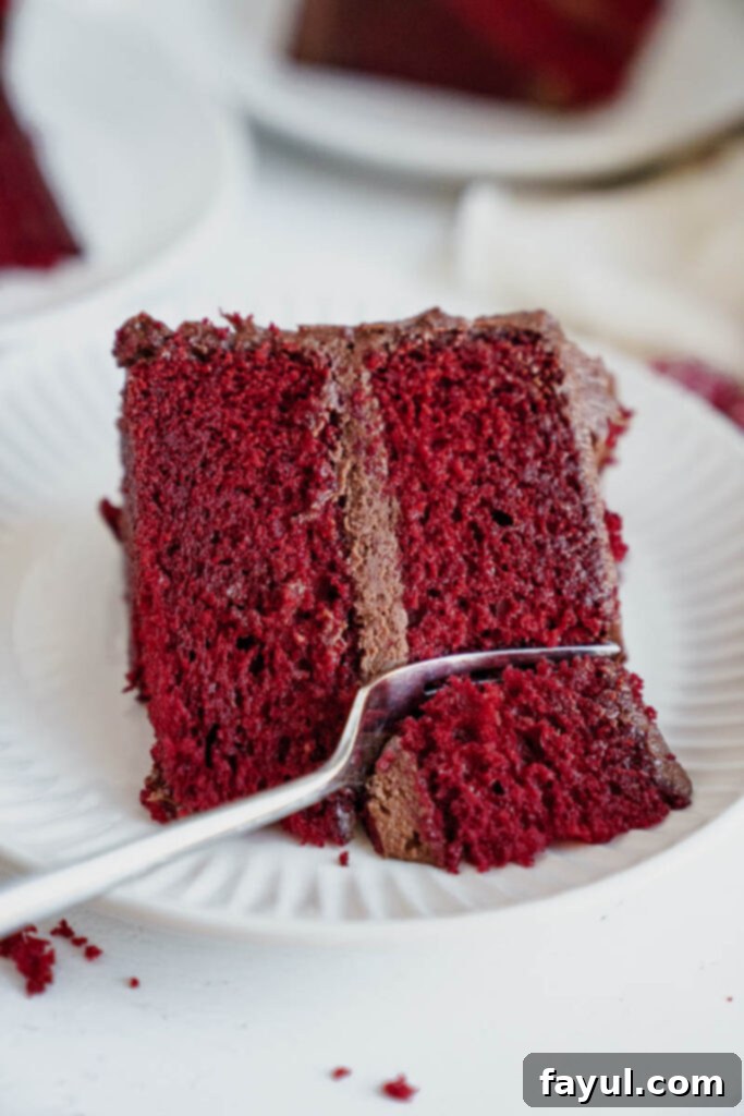 full red velvet cake on a stand