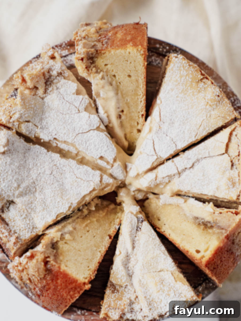Delicious Cinnamon Roll Gooey Butter Cake with a creamy topping