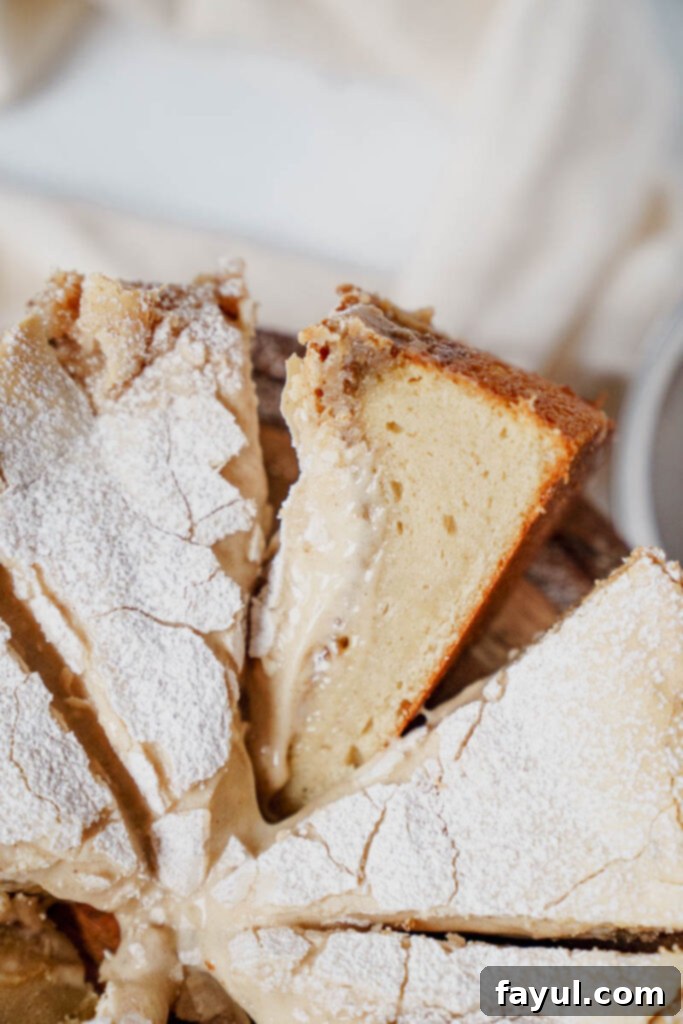 Two slices of Cinnamon Roll Gooey Butter Cake on a plate