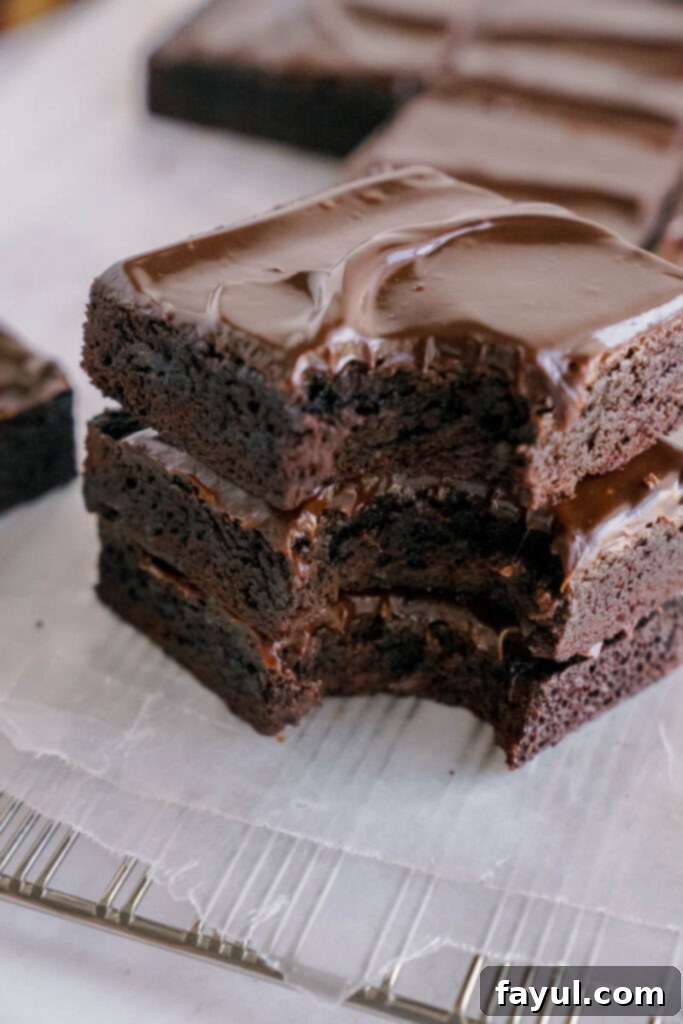 stack of lunch lady brownies with chocolate frosting