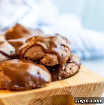 A stack of delicious Texas Sheet Cake Cookies with chocolate icing.