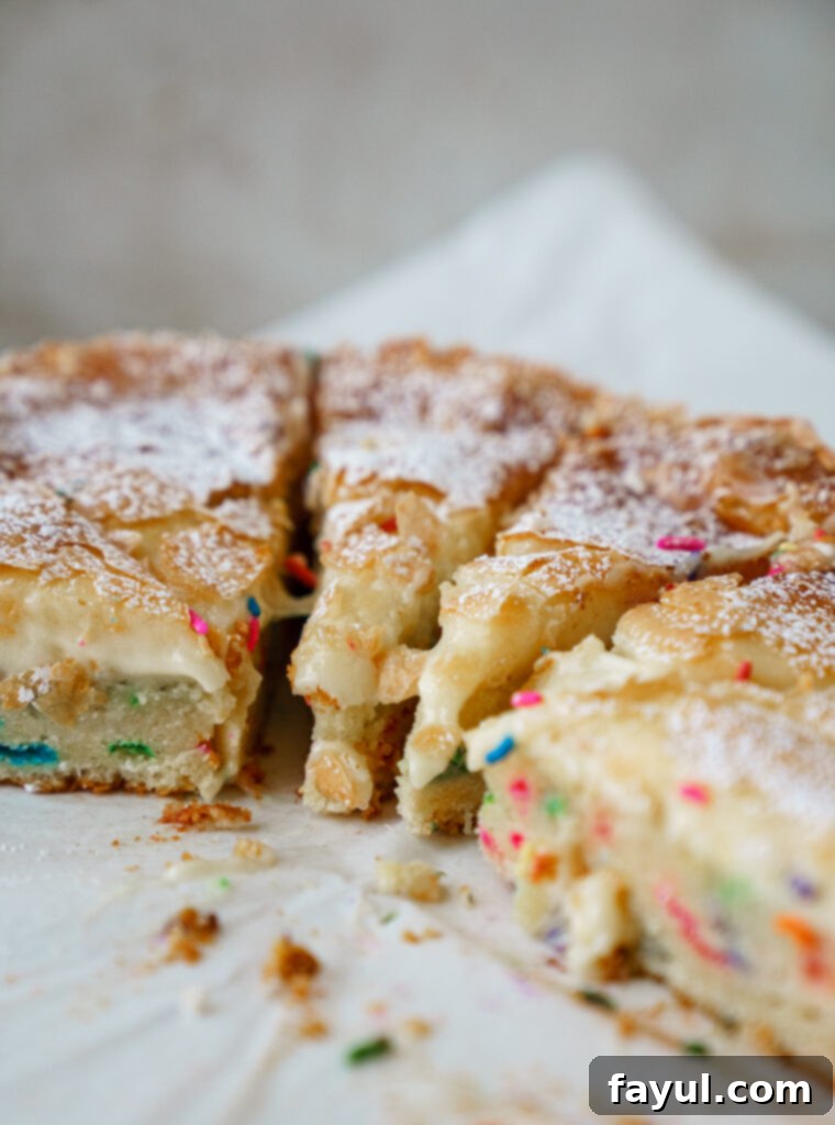 close-up of funfetti gooey butter cake showing layers