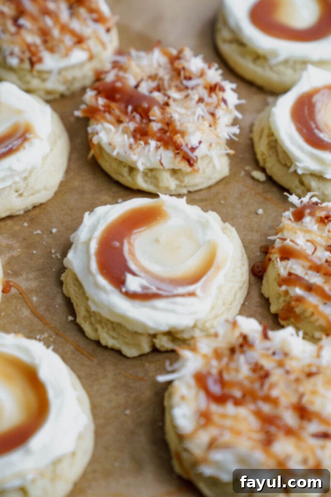 A close-up shot of a frosted coconut caramel sugar cookie on a plate