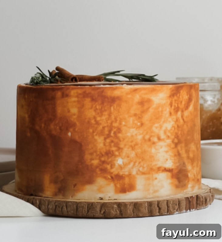 Close-up of a perfectly baked Cinnamon Caramel Apple Cake layer with visible cinnamon swirl
